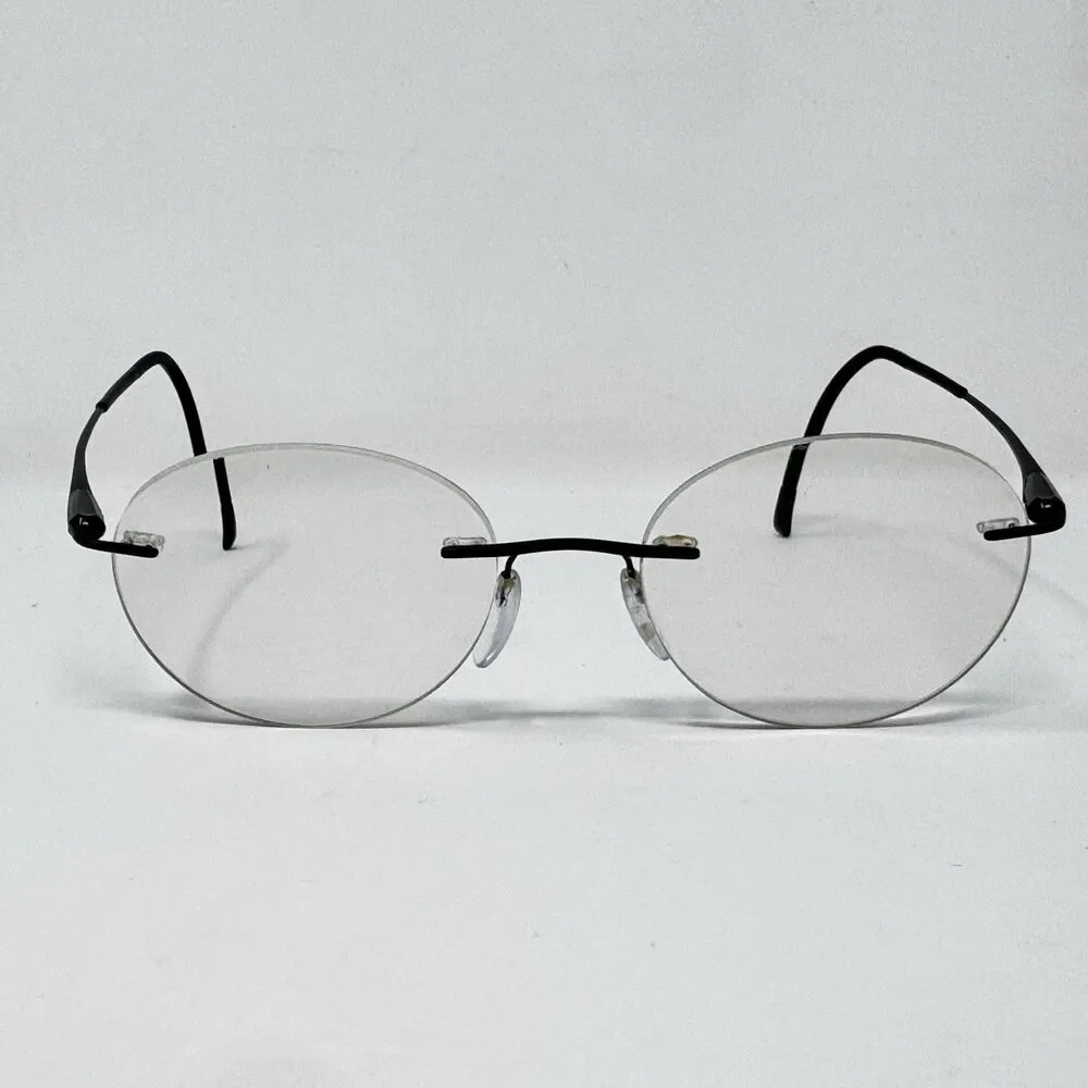 Silhouette 5561 70 9040 86D Rimless Eyeglass Frames Black 19-150 Austria
